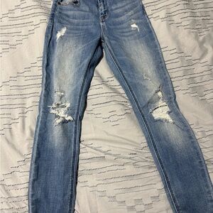 Blue Skinny Jeans with Distressed Details